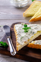 Fried bread on the grill with a crispy crust with garlic sauce, seasoned with herbs