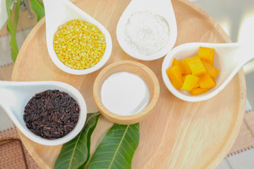 brown sticky rice coconut milk ripe mango. traditional Thai dessert