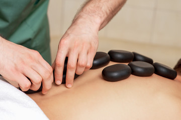 Massage stones on back.