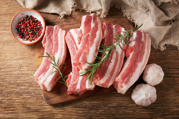 fresh pork ribs with rosemary, top view