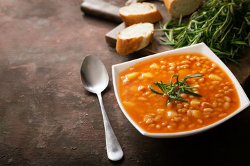 bowl of bean soup with rosemary