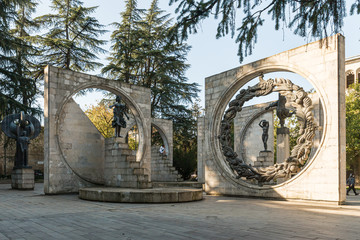 Sculptural group made of stone and metal opposite the city opera house on the Shota Rustaveli Ave in the old part of Kutaisi in Georgia
