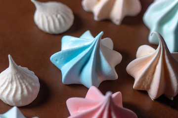 colored meringues on top of the cake