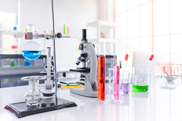 Science test tube and equipment on white top table in science lab