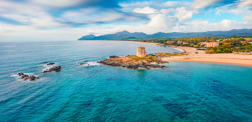 View from flying drone. Panoramic summer view of Torre di Bari tower. Aerial morning scene of...