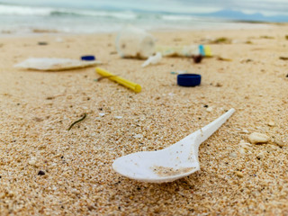 Fototapeta na wymiar Plastic pollution on a shore of ocean