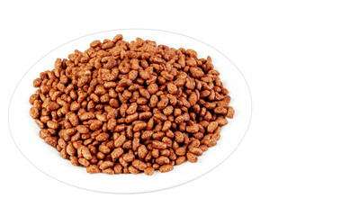 Breakfast with chocolate rice on isolated background, side view. Space for tex