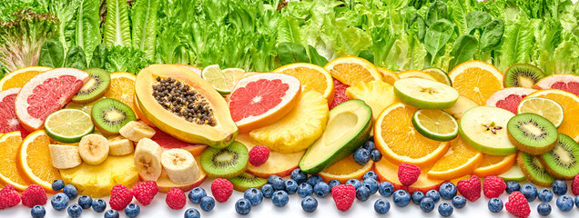 Fresh fruit berries green salad collection. Tropical papaya, pineapple, apple, orange, kiwi,mixed citrus salads food. Healthy fruity diet concept. Fruit background, banner