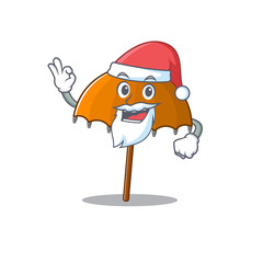 Orange umbrella in Santa cartoon character design showing ok finger