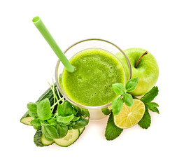 Apple, basil, cucumber fruit green smoothie. Detox fresh healthy eating diet concept. Green apple fruit vegan smoothie isolated on white. Freshness fruity greens homemade smoothie cocktail
