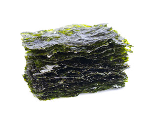 Crispy nori seaweed isolated on white background. Japanese food nori. Dry seaweed sheets.