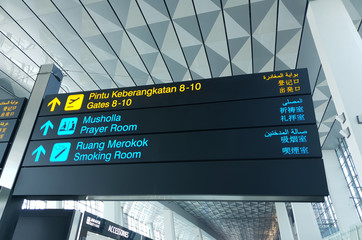 Tangerang, Indonesia - 20th June 2019: Airport sign board in Jakarta's airport, Soekarno Hatta, terminal 3. Due to covid-19 pandemic, people are advised to reduce travel.