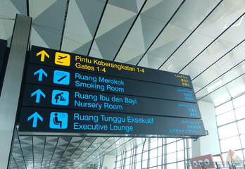 Tangerang, Indonesia - 20th June 2019: Airport sign board in Jakarta's airport, Soekarno Hatta, terminal 3. Due to covid-19 pandemic, people are advised to reduce travel.