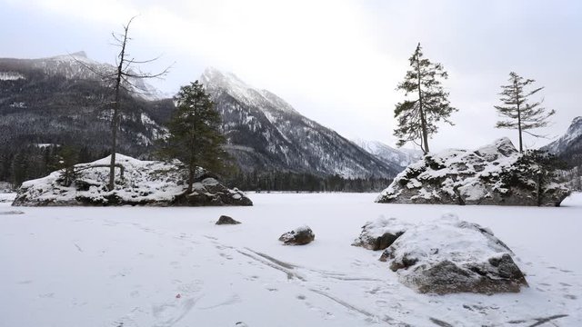 snow covered lake hintersee in winter, ramsau, bavaria, time lapse