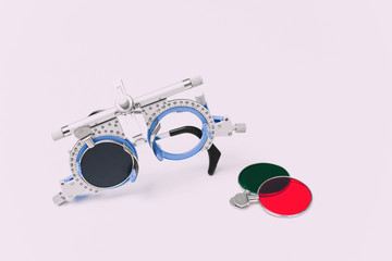 Optometrist trial frame on white background, Concept Check visual acuity and select glasses from an...