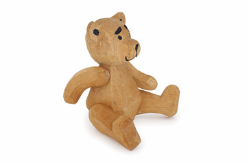 Hardwood teddy-bear with isolated on a white background