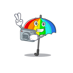Rainbow umbrella mascot design as a professional photographer with a camera