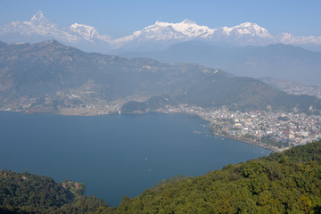 Fototapeta na wymiar Arial view on Pokhara city, lake Phewa and the Himalayan range on Nepal