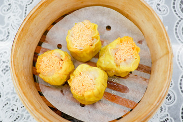 Delicious Chinese steamed shrimp dimsum in bamboo containers
