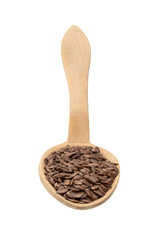 Linseed or flax seeds on a wood spoon seen directly from front and isolated on white background