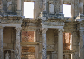 Facade of ancient Celsius Library in Ephesus Turkey. Ancient ruins in Ephesus Izmir Turkey - archeology background. Marble reliefs in Ephesus historical ancient city