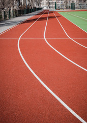 Fototapeta premium Red treadmill at the stadium