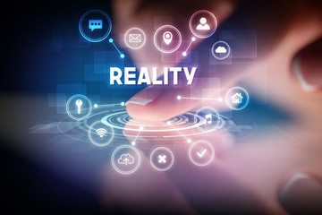 Finger touching tablet with web technology icons and REALITY inscription, web technology concept