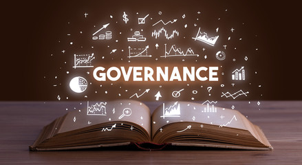 GOVERNANCE inscription coming out from an open book, business concept