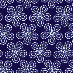 Vector blue shibori bigger floral pattern seamless background. Suitable for textile, gift wrap and wallpaper.
