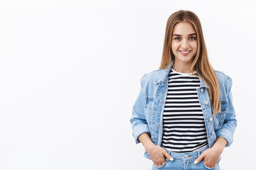 Obraz premium Ready young blond smiling woman professional, hold hands in pockets with happy face, confident in own abilities, lifestyle and people emotions concept, standing white background spring outfit
