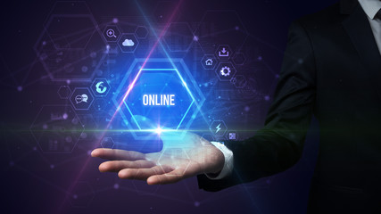 Fototapeta premium Man hand holding ONLINE inscription, social media concept