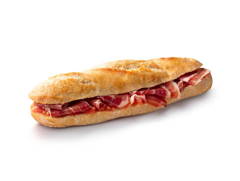 baguette de jam&oacute;n y tomate sobre fondo blanco, bocadillo. ham and tomato baguette on white background, sandwich.
