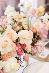Beautiful luxury bouquet of mixed flowers. Wedding details. Wedding rings