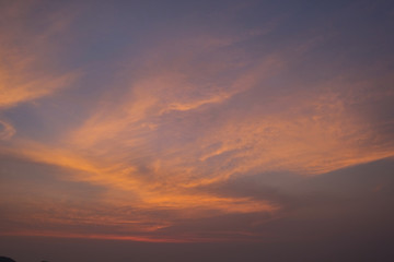 Stunning purple sunset on a tropical beach.