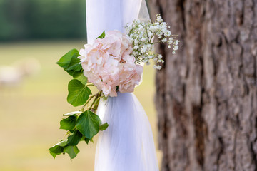 Details of a luxurious floral arrangement of a wedding or ceremony