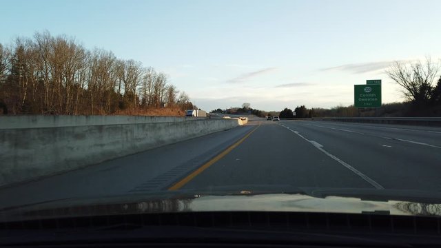 First Person View In Vehicle Driving Down Interstate 75 Through Kentucky At Sunset