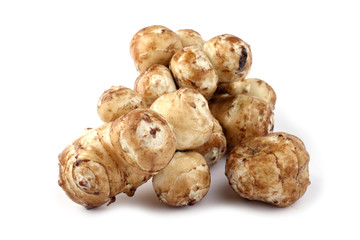 Jerusalem artichokes isolated on white