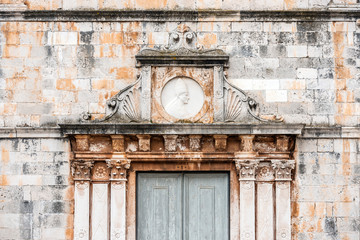 A close up detail shot of a beautiful building facade in Malta.
