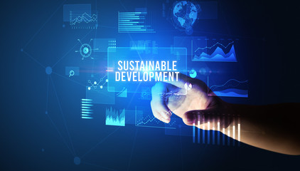 Hand touching SUSTAINABLE DEVELOPMENT inscription, new business technology concept