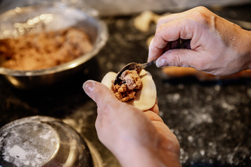 Making homemade dumplings with meat