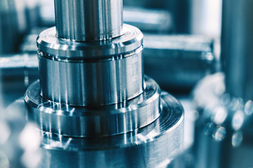 Shiny metal parts made at the factory, closeup