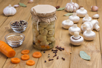 Fototapeta na wymiar Glass jar with canned mushrooms.