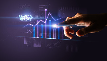 Hand touching FINANCIAL REPORT button, business concept