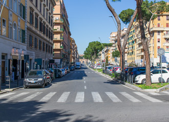 Fototapeta na wymiar Rome, Italy - following the coronavirus outbreak, the italian Government has decided for a massive curfew, and cities like Rome look like ghost towns, with empty streets, shops closed, and no people 