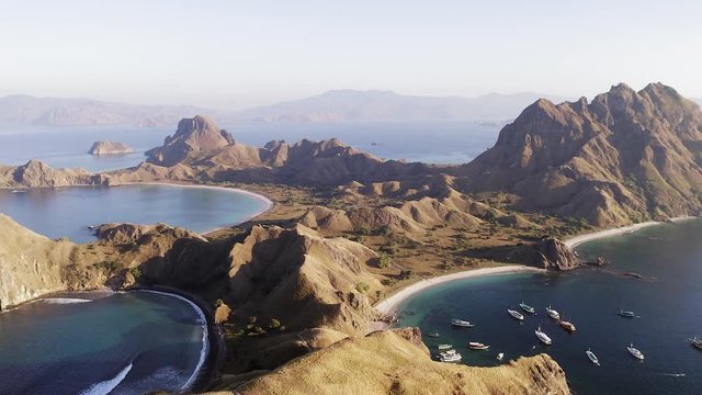 Aerial footage of Padar Island, Indonesia, known for its rugged hills and beautiful virgin sandy Beaches.