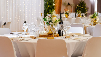 Table set with glasses, wine, alcohol and champagne for a celebration or a wedding