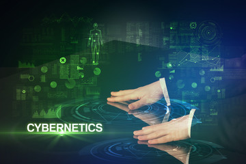 Businessman touching huge display with CYBERNETICS inscription, modern technology concept
