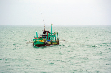 Obraz premium Lonely fishing boat