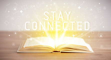 Open book with STAY CONNECTED inscription, social media concept