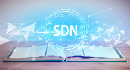 Open book with SDN abbreviation, modern technology concept